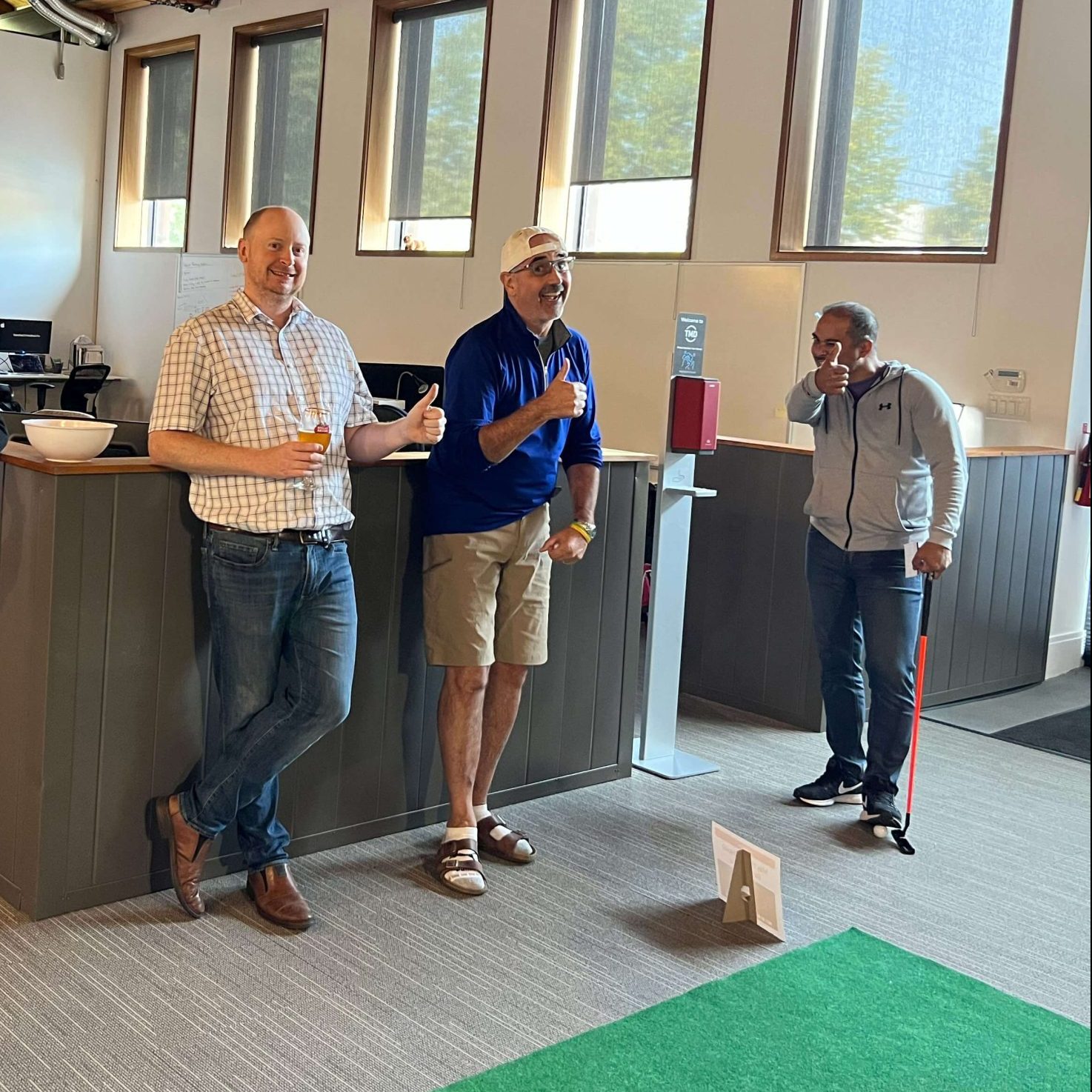 TMD employees playing minigolf together