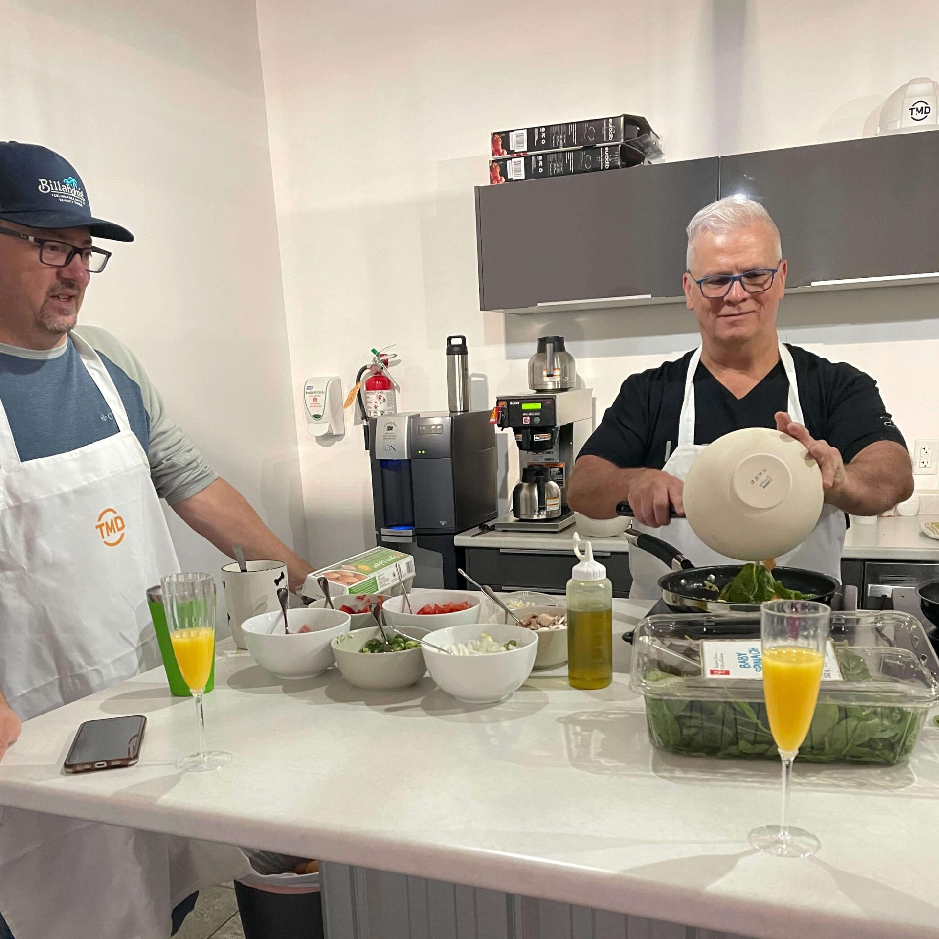 TMD staff preparing a meal together