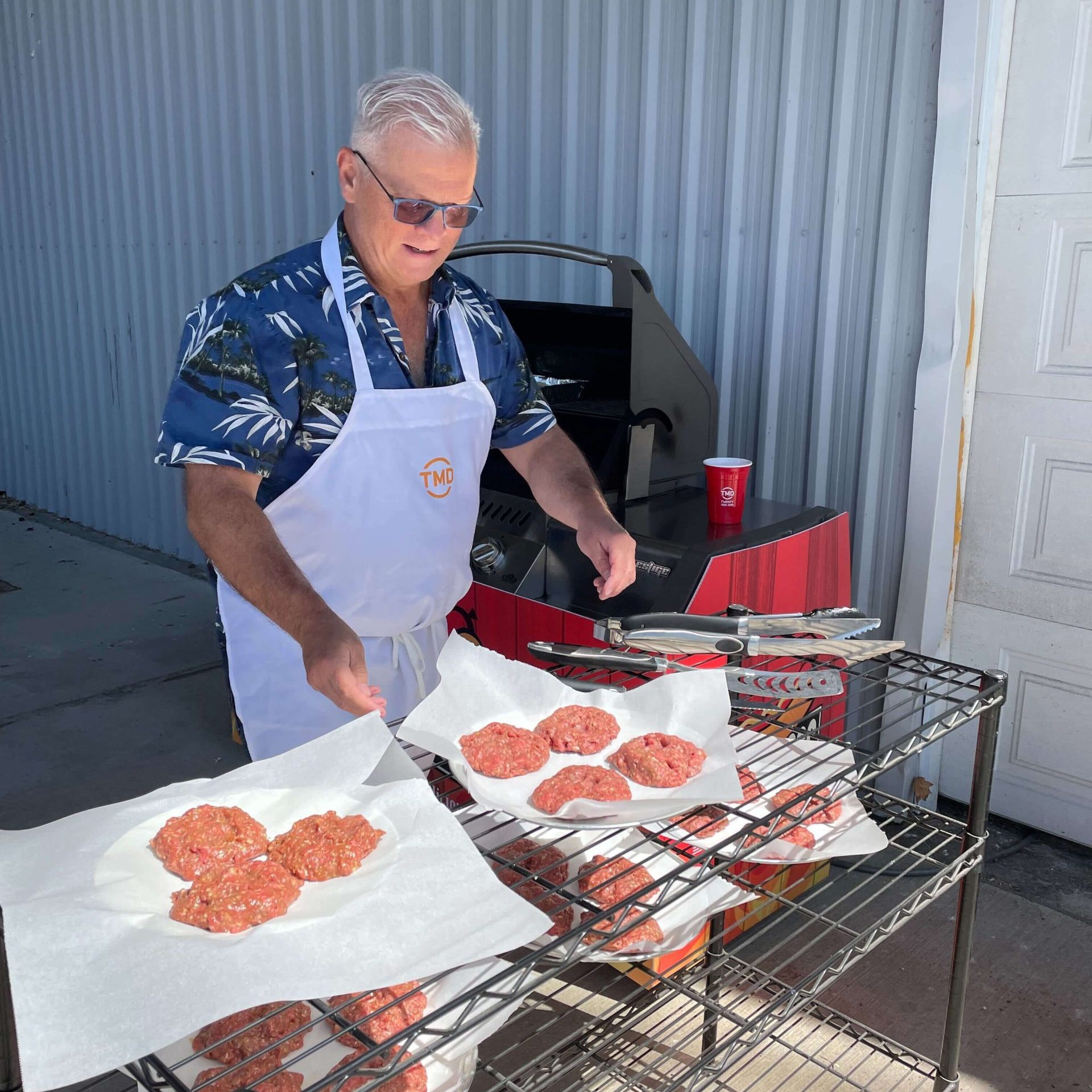 TMD CEO grilling some food
