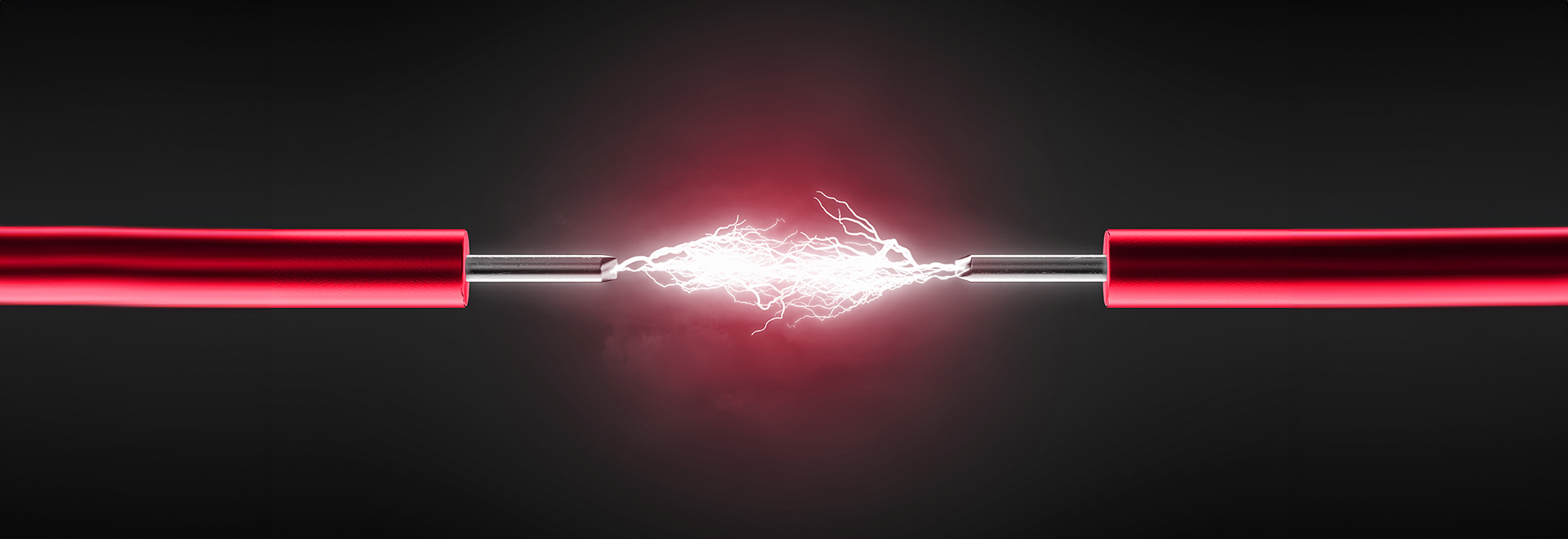 Two red wires meeting causing a glowing red spark.